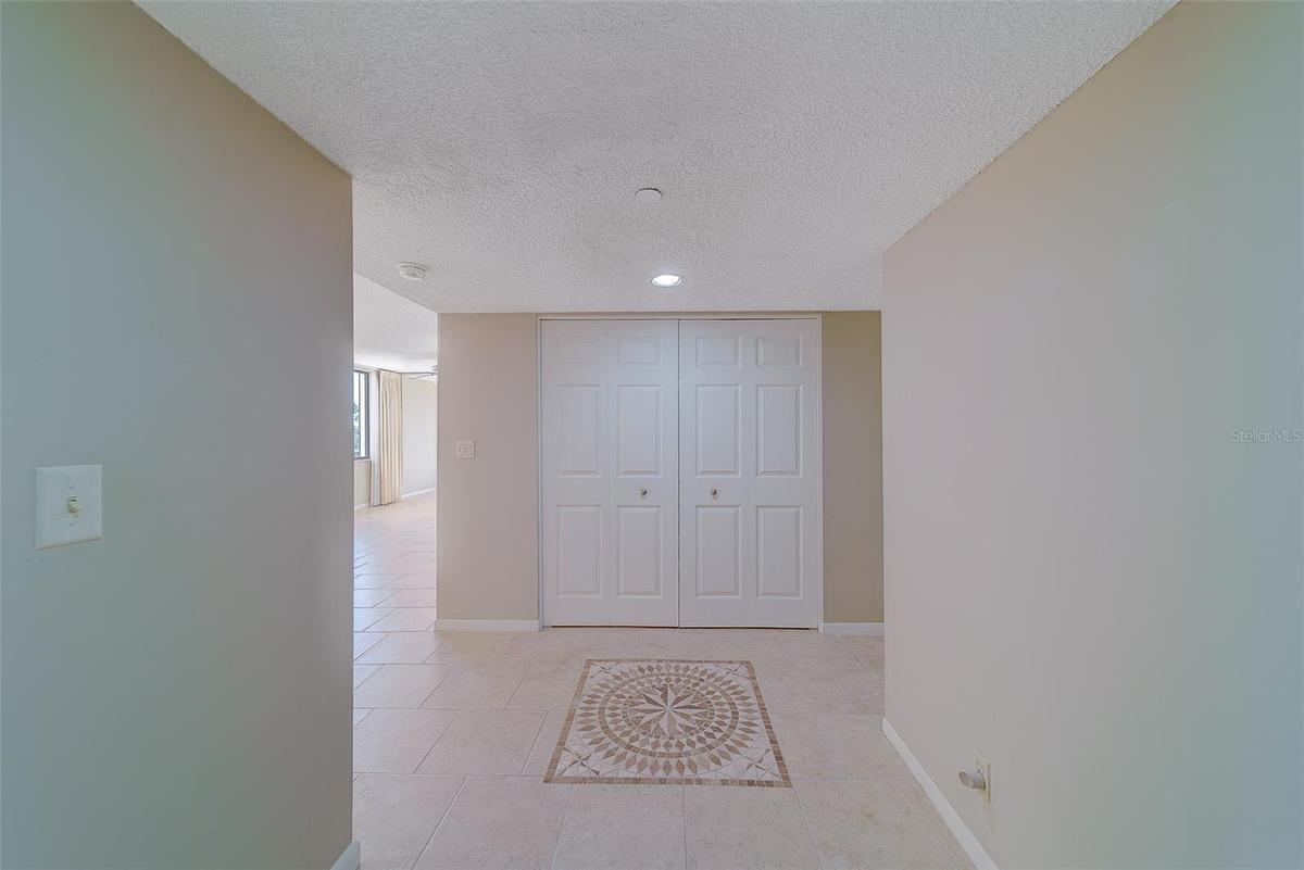 Foyer area with a large closet space