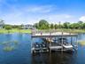 Existing double deck boat dock. Boats have been virtually added to illustrate potential use.