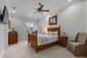In law suite with wet bar, fridge, full en suite bathroom, it's own entrance from outside.