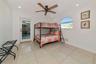 First floor bonus room can be used as a bedroom , an art studio or a craft room