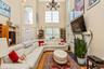 Two-story living area with high ceilings