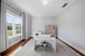 This room has plenty of natural light, and could be used as a home office or hobby room