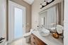 This half bath is downstairs and in a perfect location for guests.