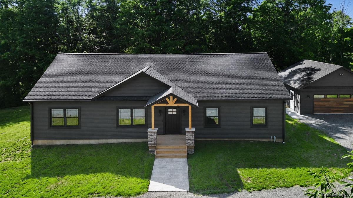 Front of home, masonry work to be completed - digitally enhanced here.