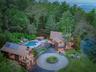 Bird's eye view featuring a view of heated pool