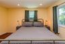 Recessed ceiling lighting, wood-finish flooring, and multiple windows