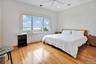 5th Bedroom with Bay views light wood-style floors, a water view, a ceiling fan, and recessed lighting