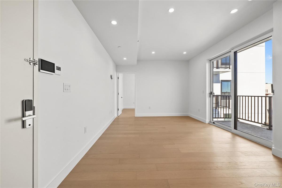 Spare room featuring recessed lighting and light wood-type flooring