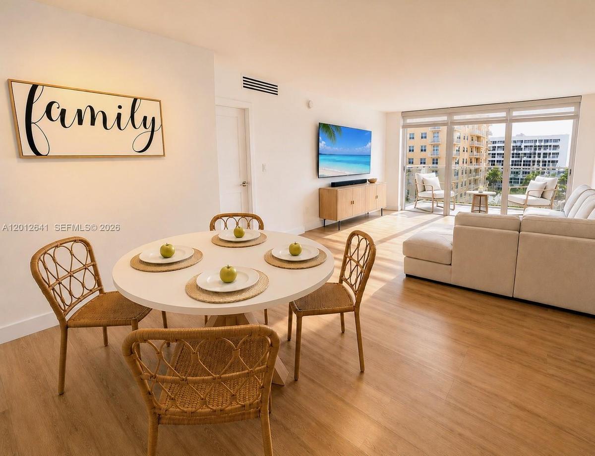 SPACIOUS LIVING AREAS WITH PRIME SUNNY SOUTHERN EXPOSURE AND ELEVATED OCEANSIDE GLASS TERRACE VIEWS