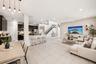Virtually staged great room open to the kitchen