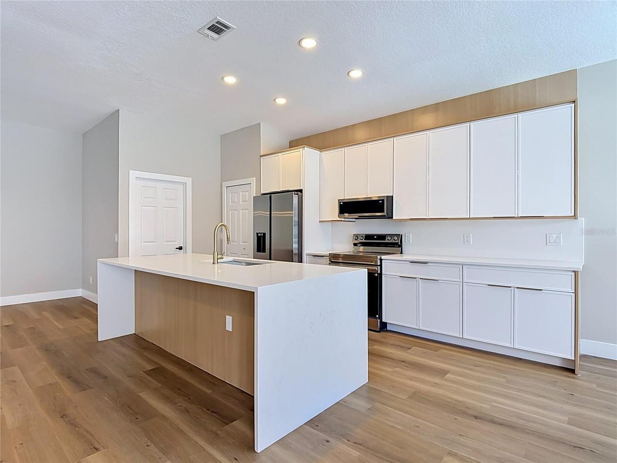 fully renovated kitchen with quartz countertops