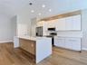 fully renovated kitchen with quartz countertops