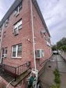 All Brick Corner lot Newer Building with full finished basement with outside entrance.  Total 4 family  apartment. mixed use building