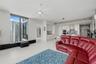“smart” family room features a comfortable leather sofa with three motorized loungers, a 120” state-of-the-art projection TV that rises from the floor