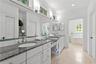 The architectural details continue throughout the owner's en suite
