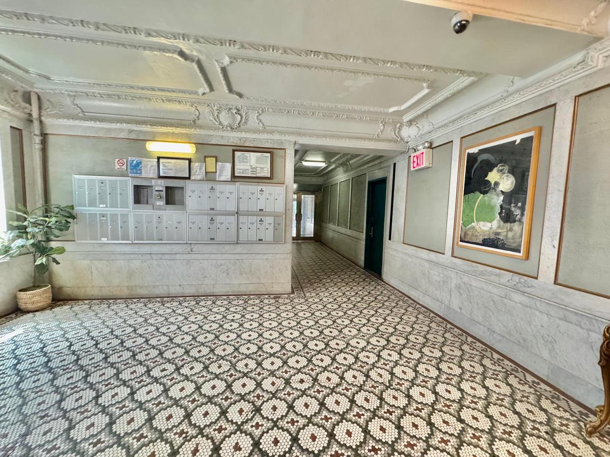Corridor with mail area and ornamental molding