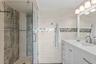 En suite bathroom walk-in shower.