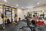 Workout area featuring recessed lighting