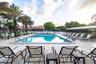 MAIN COMMUNITY POOL WITH SEPARATE JACUZZI ON THE LAKE NEXT TO FANTASTIC CLUBHOUSE WITH KITCHEN, GYM AND SITTING AREA