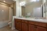 Third bathroom is across from the second bedroom.