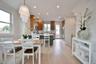 Dining space featuring light wood finished floors and recessed lighting