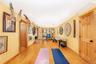 Workout room with light wood-type flooring and recessed lighting
