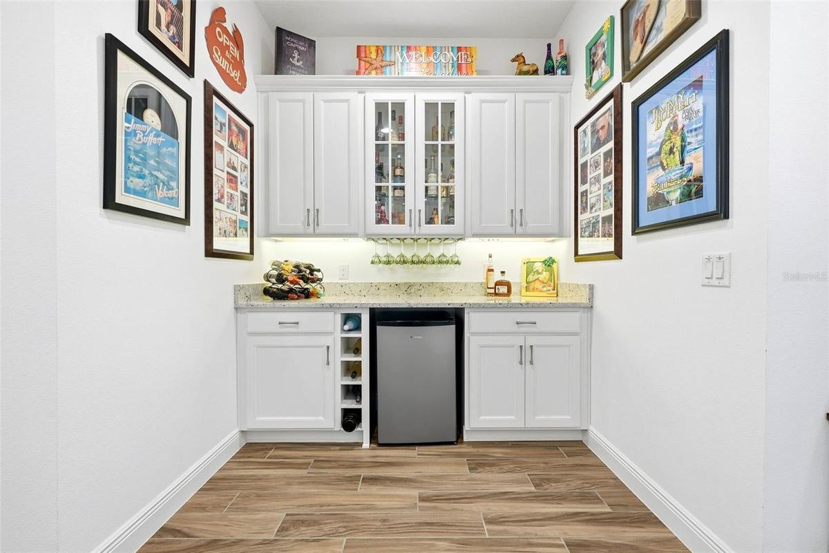 Head into the heart of the home and spot the Margaritaville Dry Bar on your left—ready for fun and relaxation!