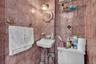 Half bath with tile walls