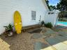 View of home's exterior featuring a fenced in pool