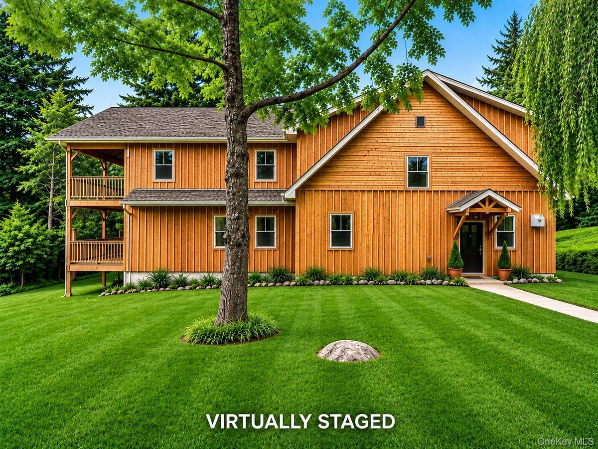 Board and Batten wood home with two side porches