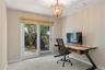 Private Office space adjacent to Kitchen and opens to the private, brick courtyard