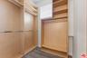 Walk-in closet featuring light