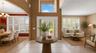 Grand entry & souring ceilings greet your guests. (virtually staged)