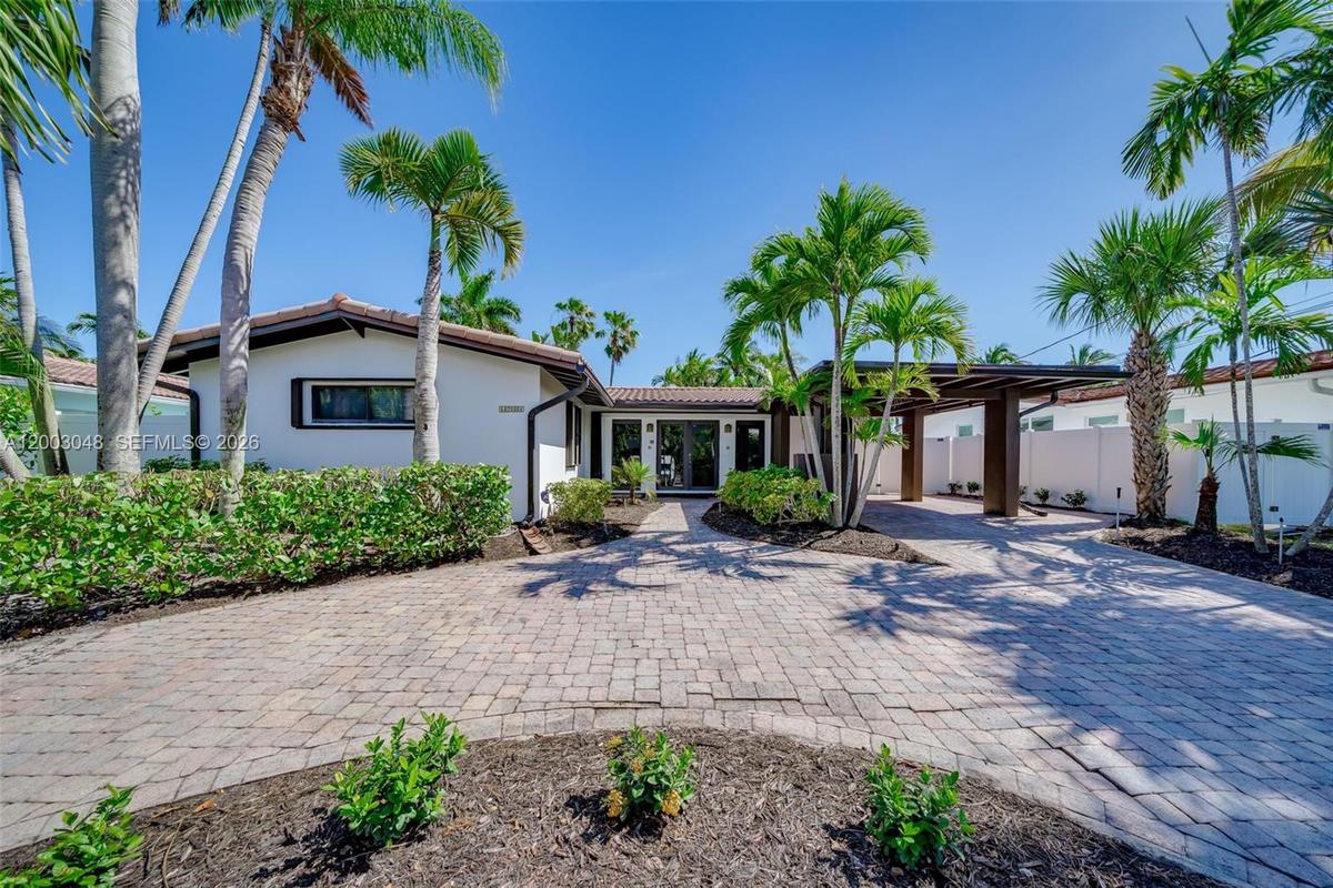 Waterfront Home | Modern Entry & Paver Driveway | South Florida