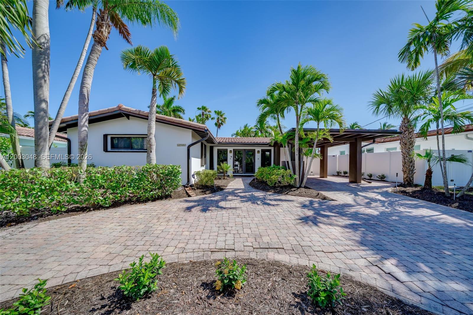 Waterfront Home | Modern Entry & Paver Driveway | South Florida