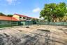 Behind the property is this community tennis court, which is currently not being used