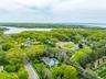 View of property location featuring a nearby body of water and property parcel outlined