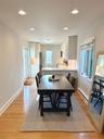 Dining room featuring light hardwood / wood-style floors and baseboard heating
