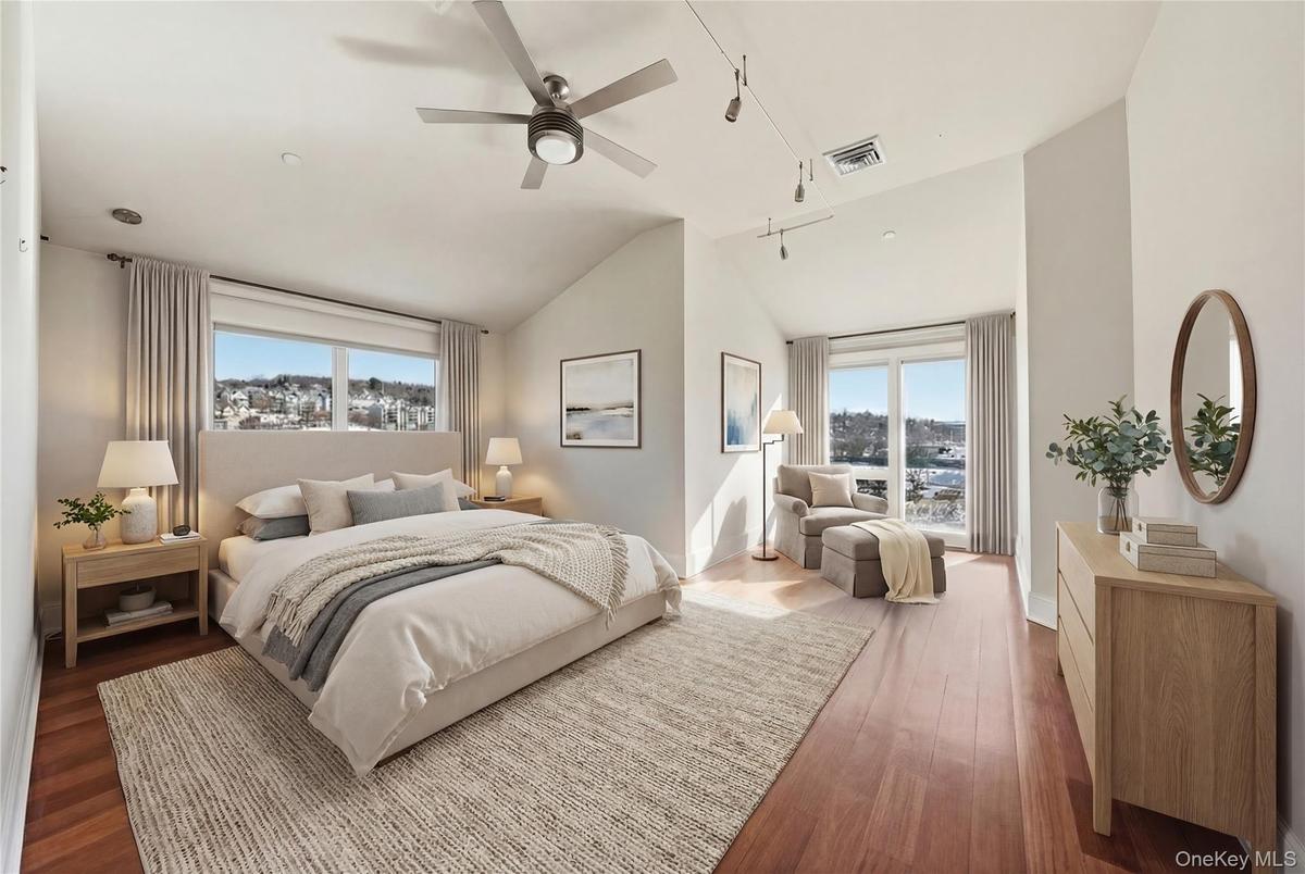 Virtually Staged. 1 of 2 Primary En Suites.