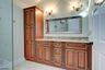Primary vanity & linen storage