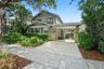 Welcome home to a charming 1936 Craftsman, tucked along a picturesque brick street just blocks from Crescent Lake Park.