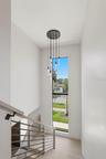 Designer light creates dramatic visual from outside