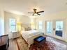 Owners suite with french doors to the back porch