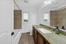 Full Updated Hall Bathroom with granite vanity