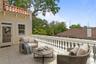 Virtually staged private terrace off the 5th bedroom