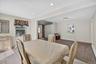 Dining space featuring baseboard heating, light tile patterned flooring, recessed lighting, and a baseboard radiator