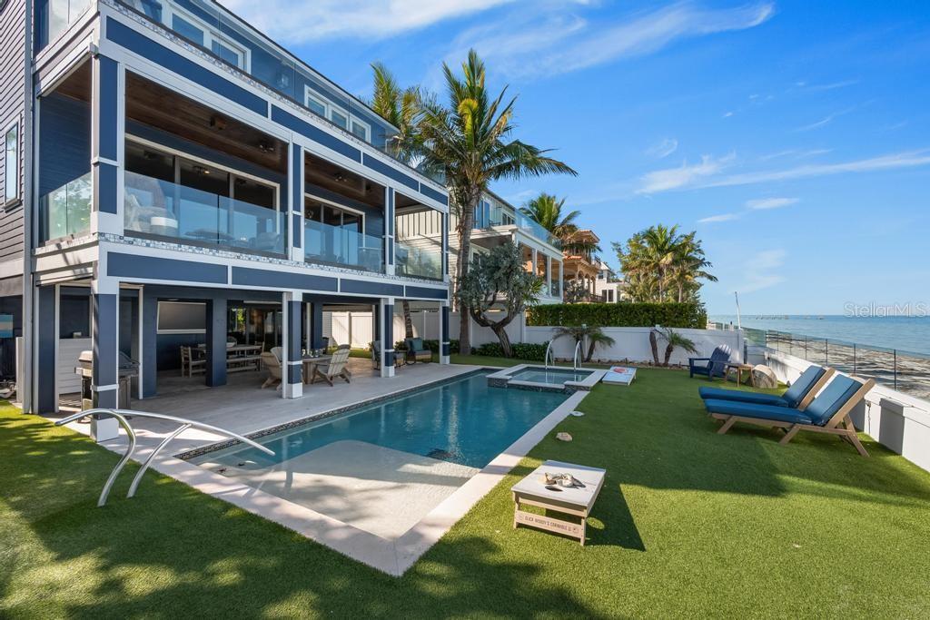 Heated pool and spa with direct beachfront access