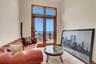 w/ bedroom, seating area and private bath