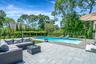 Swimming pool featuring a patio area and an outdoor hangout area