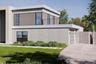 View of side of property with stucco siding and a lawn